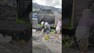 Locals collect volcanic ash from the river and turn it into money