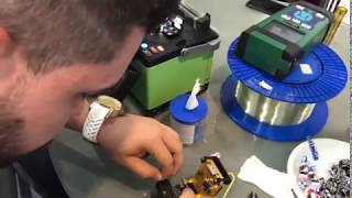 A Visitor Using The Orientek Fusion Splicer T45, Optic Fiber Cleaver In Netcom 2019