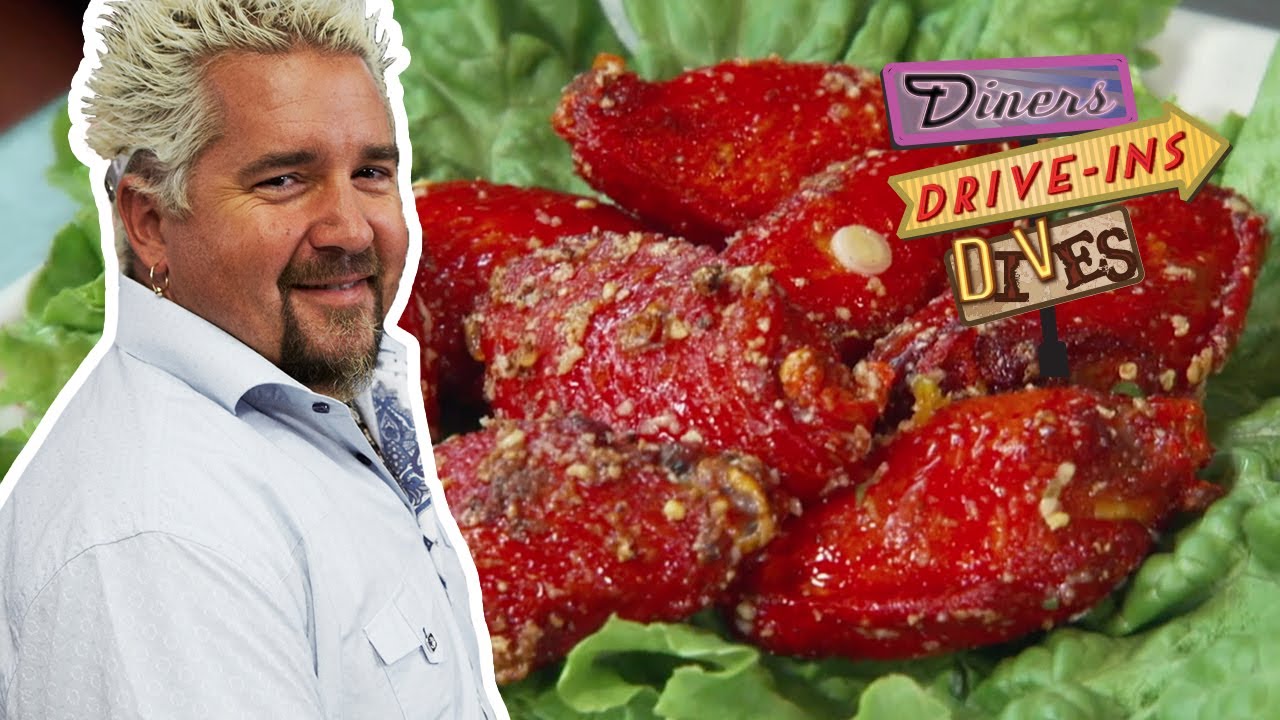 SCREAMING Red Spicy Garlic Wings | Diners, Drive-ins and Dives with Guy Fieri | Food Network