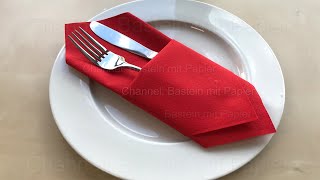 Servietten falten: Bestecktasche - Tischdeko basteln mit Papier-Servietten für Silvester