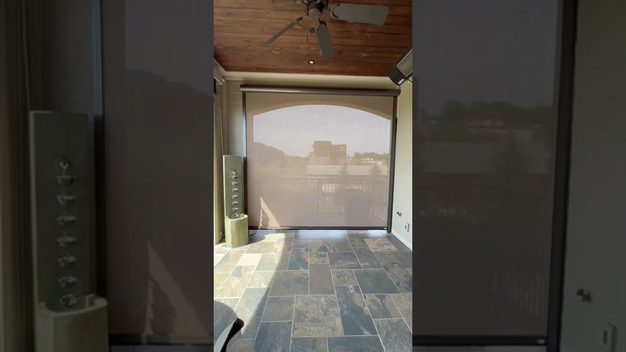 Motorized Retractable Shade Phifer 97 Block Mocha installed by Palmetto Outdoor Spaces