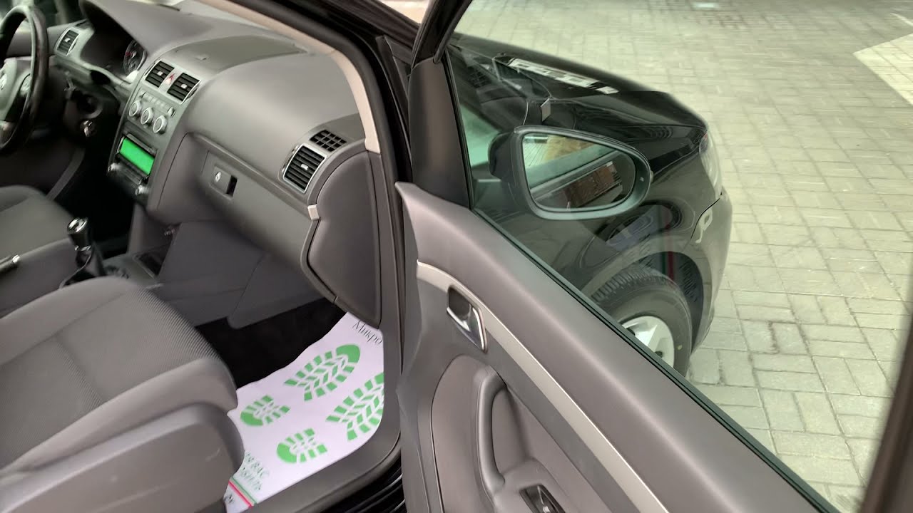 Обзор Volkswagen Touran II, 2013 г. 1.6 TDi 77kw(105 hp) Европа