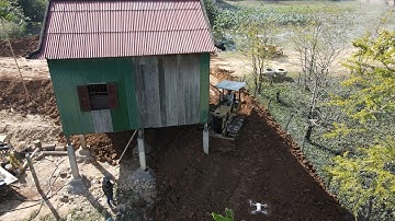 Awesome mini Bulldozer Pushing Dirt at Village Land Filling Process with Dump Truck 5ton Unloading