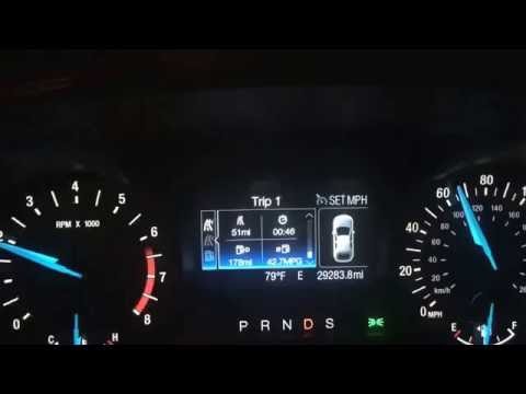 Vidéo: Combien de miles par gallon une Ford Fusion obtient-elle?