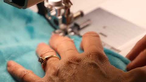 PFAFF Creative icon with Adjust Guide foot with IDT & Paula showing how to top stitch Shannon Cuddle