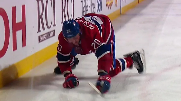 Canadiens Deslauriers slips during celebration aft...