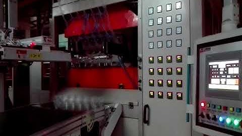 TQC 650B cup thermoforming machine with robot stacker