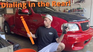 Ford Lightning Build  JLP 4 Inch Drop Shackles / Adjustable Drag Shocks Install  Rear Lowering Kit