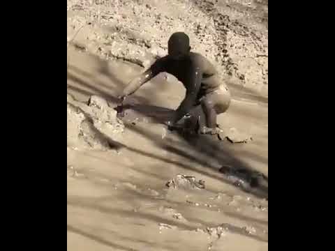 Guy Bellyflops Into Puddle Of Mud 988398