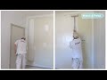 Watch  relax painting the white wall