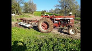 Plowing a couple of hayfields with an International moldboard plow!