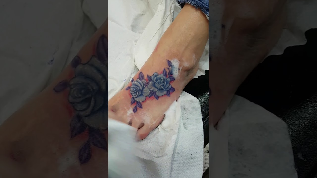 Flower tattpo on foot