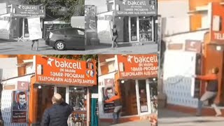 Ticarət Yanğınında öz Malı Və Mülkü Vecinə Olmadan Polad Həşimovun Rəsmi Olan Plakatı Söküb çıxarır Ticarət Yanğınında öz Malı Və Mülkü Vecinə Olmadan Polad Həşimovun Rəsmi Olan Plakatı Söküb çıxarır