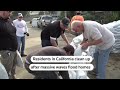 Californians clean up after waves hit | REUTERS