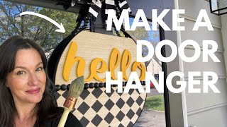 How to make a door hanger with thrifted items