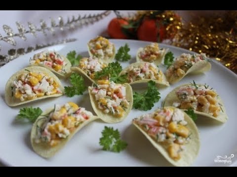 Vídeo: Saladas simples para a mesa festiva: deliciosas receitas com fotos