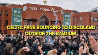 CELTIC FANS BOUNCING TO DISCOLAND OUTSIDE THE STADIUM
