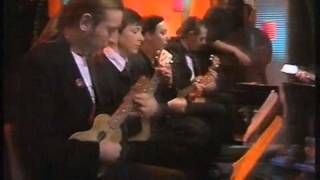 The Ukulele Orchestra of Great Britain: vintage clip from 1990 chords