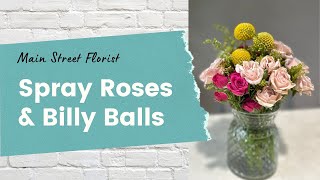 Simple flower arrangement with Spray Roses and Billy Balls