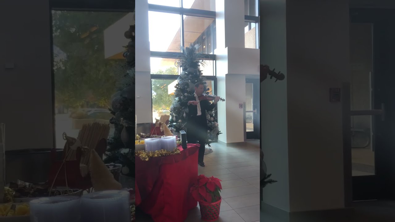 Coach Traub plays “We Wish You a Merry Christmas”