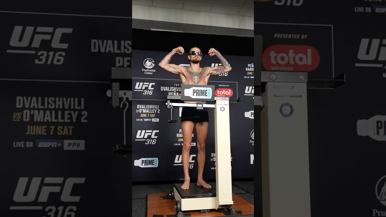 Sean O'Malley, the challenger, locked in at 135 lbs at the 