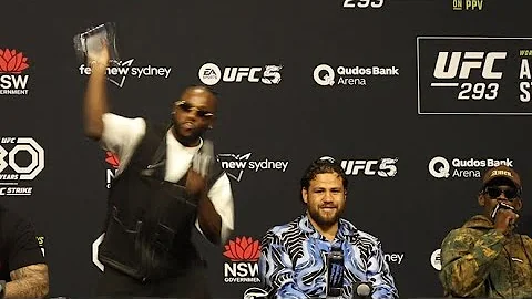 ABSOLUTE CHAOS AS MANEL KAPE THROWS DRINK BOTTLE AT KAI KARA-FRANCE DURING UFC 293 PRESS CONFERENCE