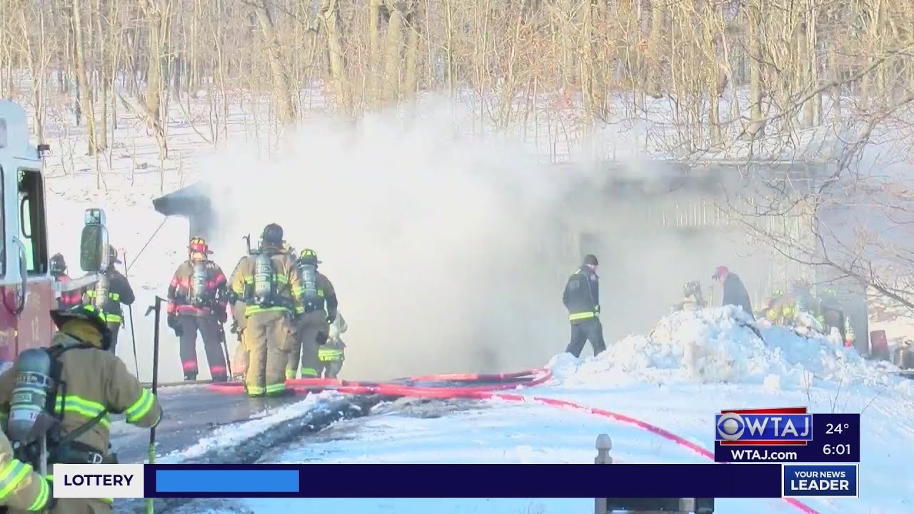 Garage roof collapses after crews respond to fire in Blair County - YouTube