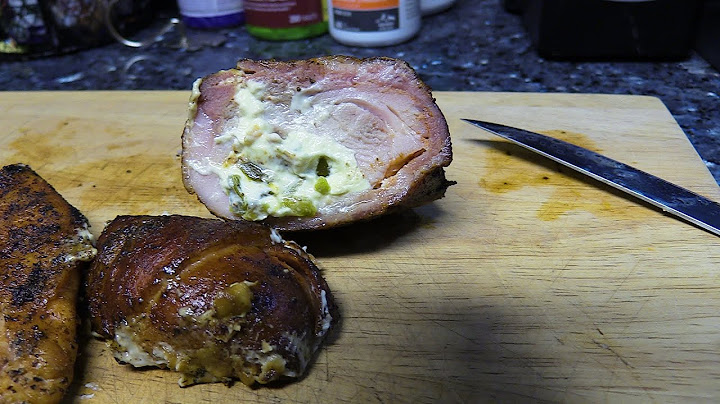 Chicken wrapped in bacon with cream cheese and jalapeno