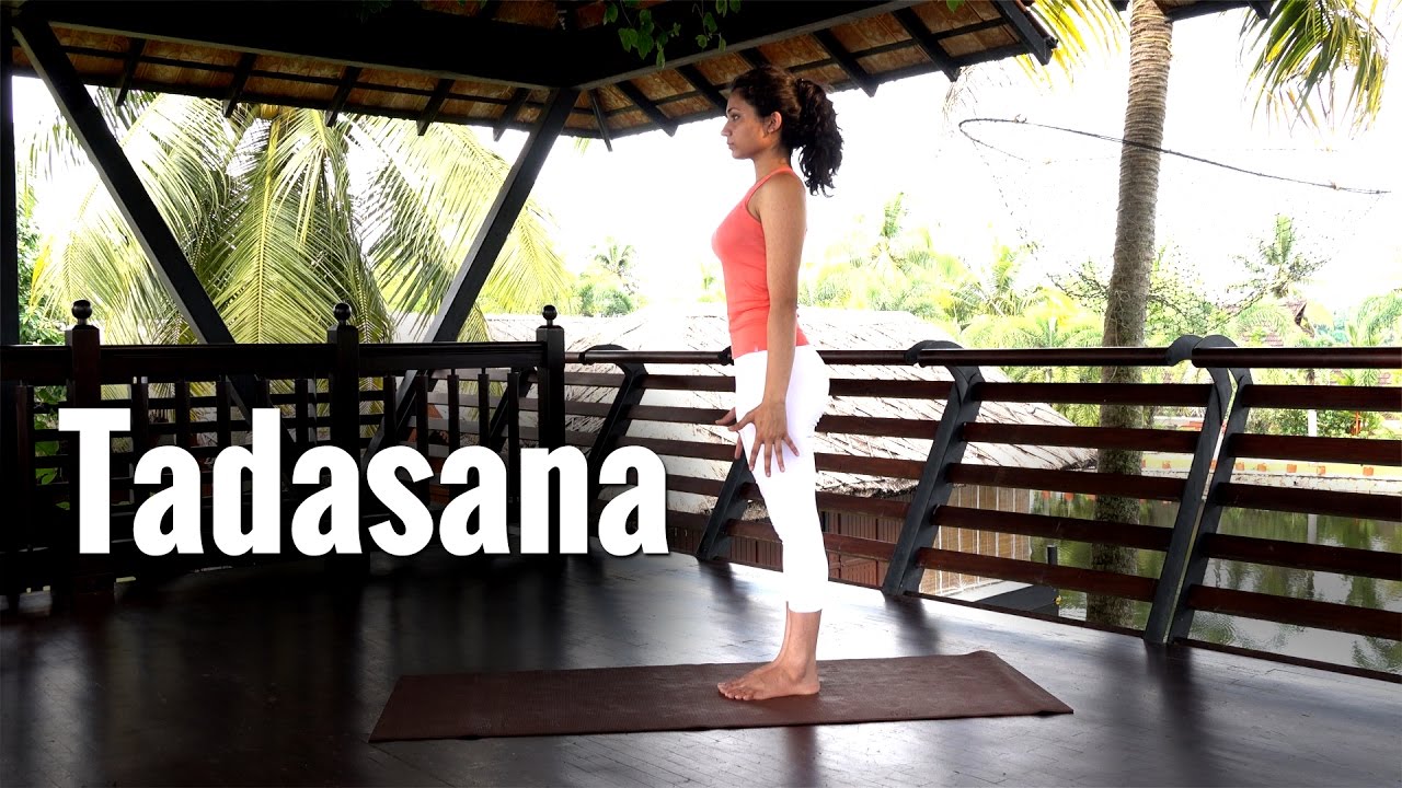 Tadasana, the basic standing pose in Yoga yoga warm up for neck and shoulders