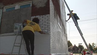 Anti-Violence group works to repair blighted building, clean up neighborhood