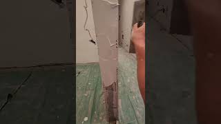 Construction site: scraping putty
