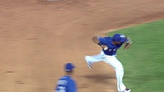 Andrus uses his bare hand to rob Jackson