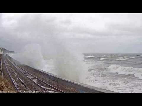 Huge Wave Smashes Windows on Train through Dawlish
