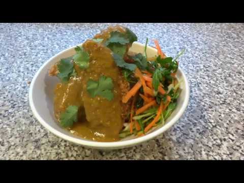 chicken katsu curry panko breadcrumbs sticky rice and salad
