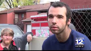 Firefighters Caught Children Tossed from Burning Apartment Building