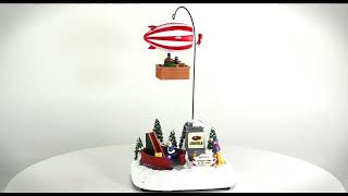 Scenario natalizio con dirigibile funzionante a batterie completo di musiche e illuminazione cm 19x15x11 h video
