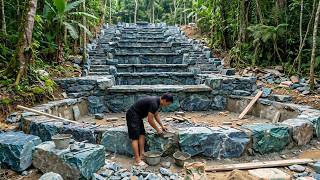 Primitive Skills: A Man Single-Handedly Transports Tons of Rocks to Build a Massive Waterfall.