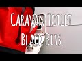 Remove  "Black bits" from a caravan toilet flush tank.