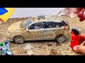 Washing dirty  miniature toyota yaris after offroading  diecast car