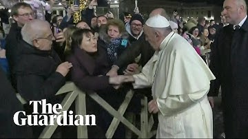 Indignant Pope Francis slaps woman