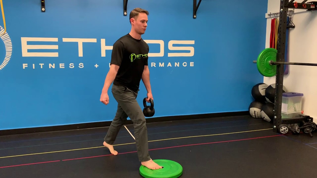 Front foot elevated kettlebell split squat - YouTube