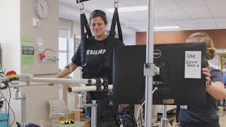 Woman learns to walk again at Orlando Hospital after COVID-19 paralyzed her