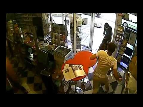 Dog Disarms Robber and Saves His Owner's Shop || ViralHog