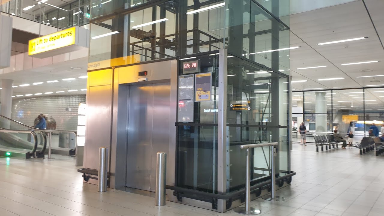 A big KONE MonoSpace elevator. Departures 3, Amsterdam Schiphol Airport, Netherlands.