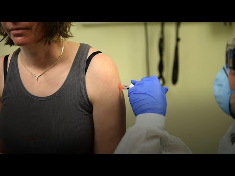 AP Exclusive: Testing COVID-19 vaccine in people