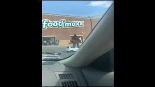 Guy Riding An Electric Bentley Skateboard