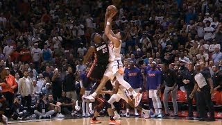 Jimmy Butler blocks on Devin Booker for final play to win game