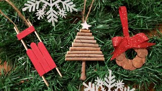 DIY adornos navideños reciclando ramas secas, paletas de helado y centavos