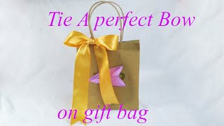 How to make a Bow | Ribbon bow | Bow making | Tie a ribbon on gift bag screenshot 5