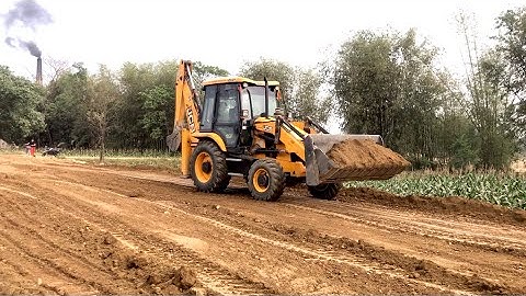 Soil Level Video, JCB Backhoe 3DX Adjusting The Soil Level on The Village Field